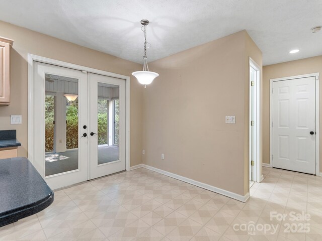 18 Westbridge Dr, Hendersonville, NC 28739 - unfurnished dining area with french doors and baseboards