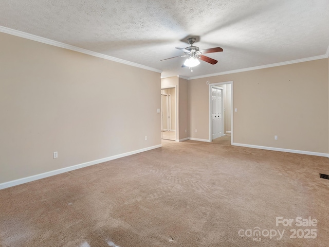 18 Westbridge Dr, Hendersonville, NC 28739 - empty room featuring a ceiling fan, ornamental molding, baseboards, light colored carpet, and a textured ceiling