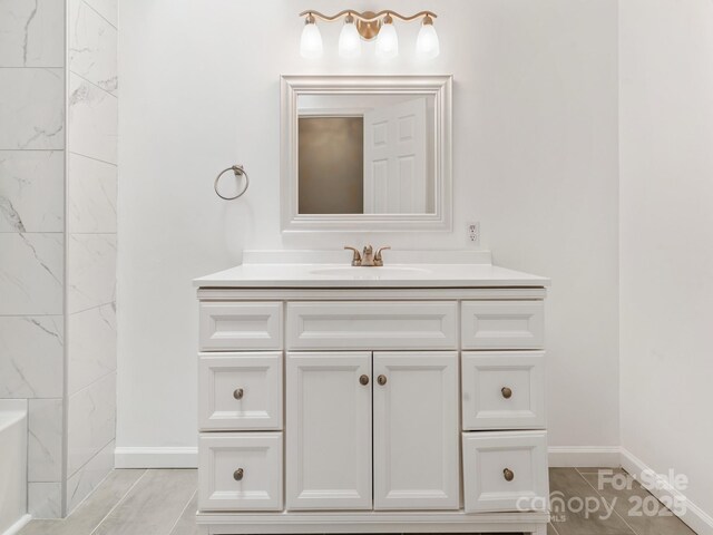 18 Westbridge Dr, Hendersonville, NC 28739 - full bathroom with vanity, a bathtub, baseboards, and a shower