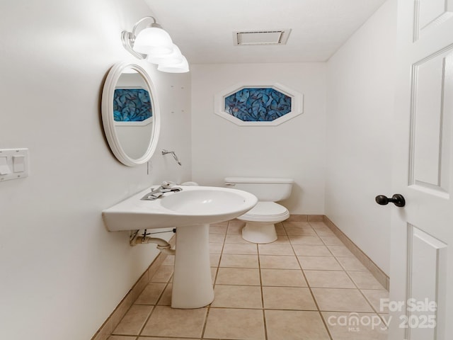 18 Westbridge Dr, Hendersonville, NC 28739 - half bath with toilet, tile patterned flooring, and baseboards