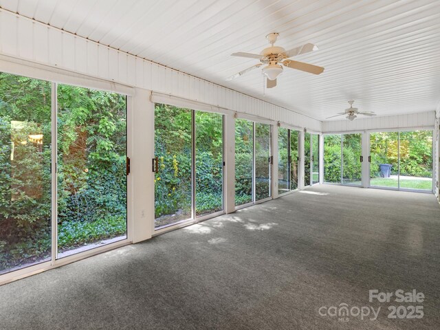 18 Westbridge Dr, Hendersonville, NC 28739 - unfurnished sunroom featuring a ceiling fan