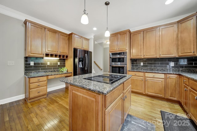 16714 Hammock Creek Pl, Charlotte, NC 28278 - kitchen with black appliances, a center island, baseboards, tasteful backsplash, and light wood-style floors