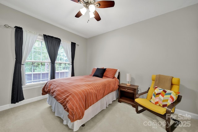16714 Hammock Creek Pl, Charlotte, NC 28278 - bedroom with baseboards, light carpet, and ceiling fan