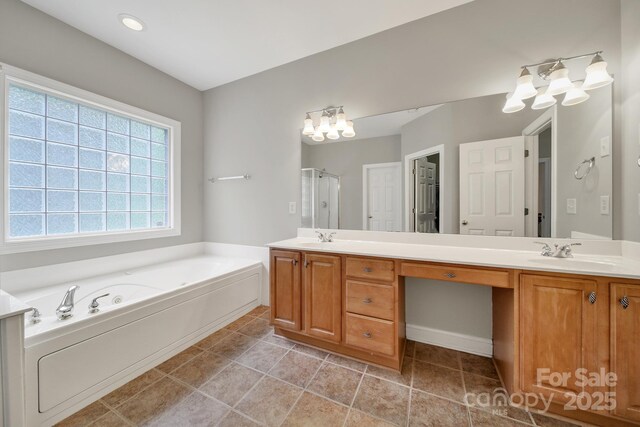 16714 Hammock Creek Pl, Charlotte, NC 28278 - full bathroom with double vanity, a bath, a chandelier, and a stall shower