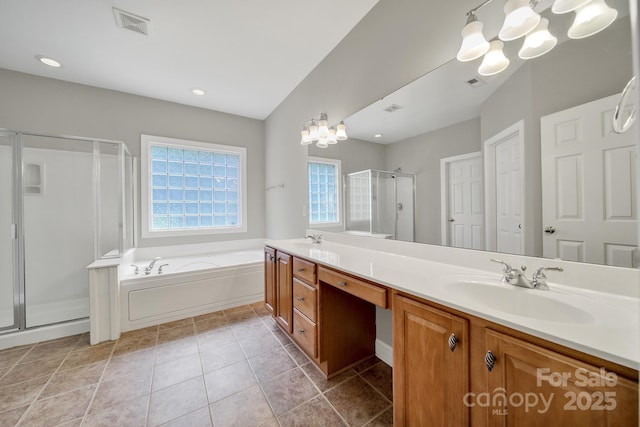 16714 Hammock Creek Pl, Charlotte, NC 28278 - full bath featuring a stall shower, a chandelier, double vanity, a garden tub, and tile patterned floors