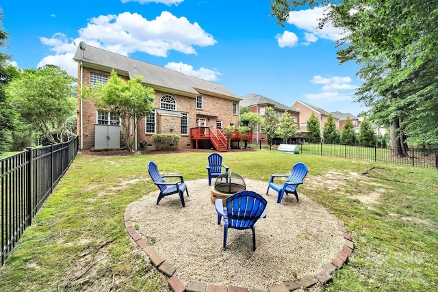 16714 Hammock Creek Pl, Charlotte, NC 28278 - view of yard featuring a fire pit, a wooden deck, and a storage shed