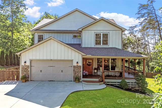 51 Cherry Ridge Ln, Weaverville, NC 28787 - view of front facade with concrete driveway, roof with shingles, covered porch, board and batten siding, and a garage