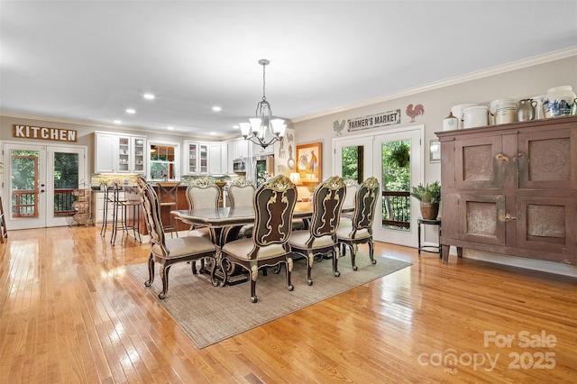 51 Cherry Ridge Ln, Weaverville, NC 28787 - dining room featuring french doors, light wood finished floors, crown molding, a chandelier, and recessed lighting