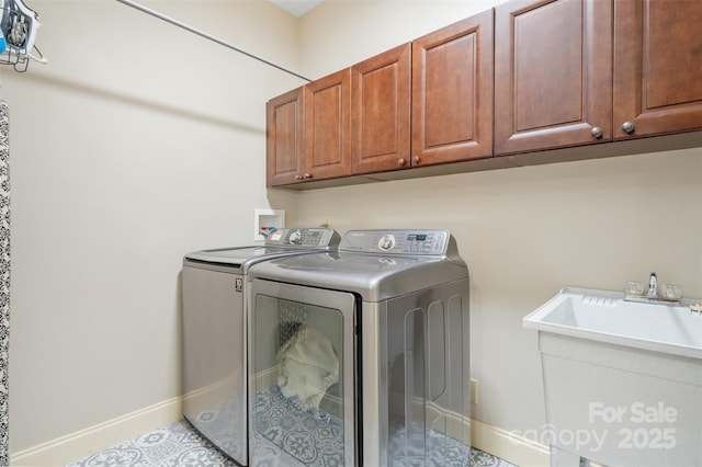 51 Cherry Ridge Ln, Weaverville, NC 28787 - washroom with washing machine and dryer, cabinet space, and baseboards