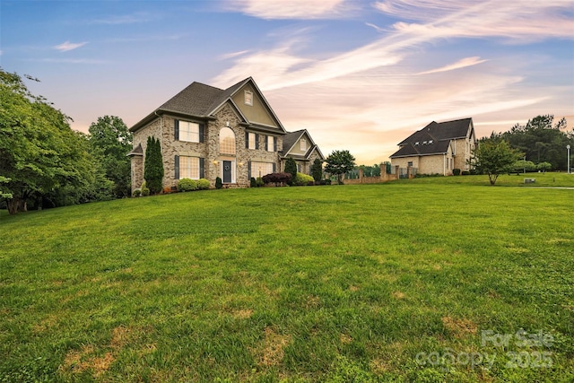 604 Gwendolyn Ct, Granite Falls, NC 28630 - view of front facade featuring a lawn and stone siding