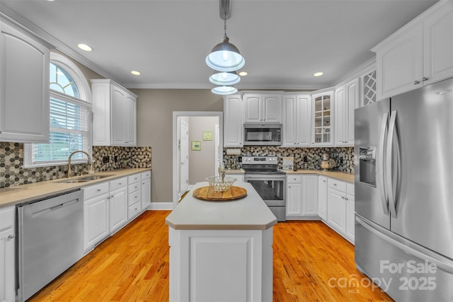 604 Gwendolyn Ct, Granite Falls, NC 28630 - kitchen featuring stainless steel appliances, white cabinetry, hanging light fixtures, light wood finished floors, and recessed lighting