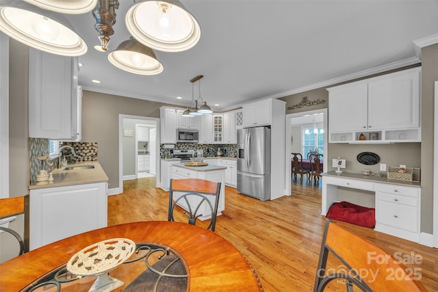 604 Gwendolyn Ct, Granite Falls, NC 28630 - dining space featuring light wood-type flooring, ornamental molding, and recessed lighting