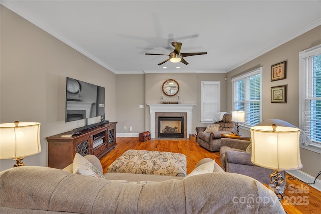 604 Gwendolyn Ct, Granite Falls, NC 28630 - living room with a fireplace, wood finished floors, ceiling fan, and ornamental molding