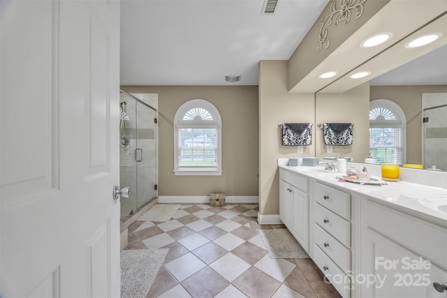 604 Gwendolyn Ct, Granite Falls, NC 28630 - full bath with a shower stall, double vanity, and tile patterned floors