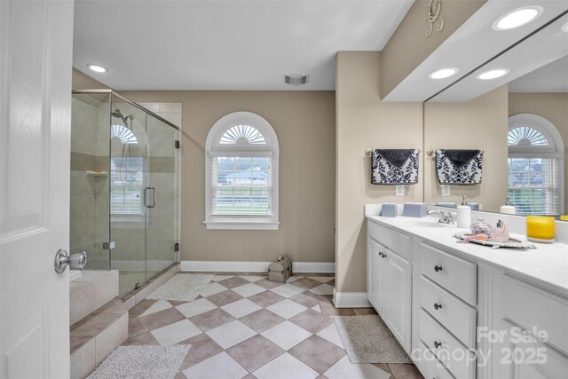 604 Gwendolyn Ct, Granite Falls, NC 28630 - full bath with plenty of natural light, vanity, a stall shower, and recessed lighting