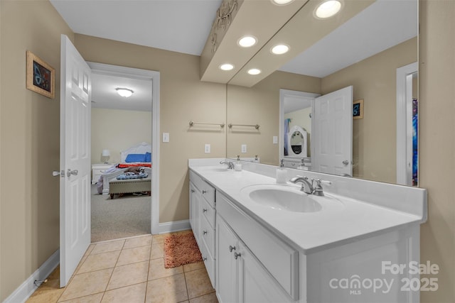 604 Gwendolyn Ct, Granite Falls, NC 28630 - ensuite bathroom with double vanity, recessed lighting, and tile patterned floors