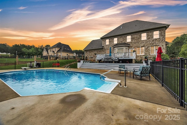 604 Gwendolyn Ct, Granite Falls, NC 28630 - pool at dusk with a patio and a diving board