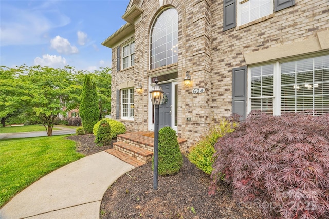 604 Gwendolyn Ct, Granite Falls, NC 28630 - property entrance with a yard and brick siding