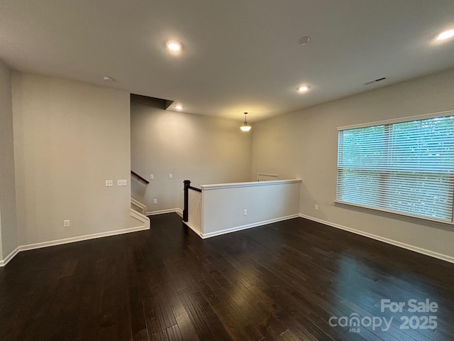 9236 Ainslie Downs St, Charlotte, NC 28273 - spare room featuring wood finished floors, recessed lighting, and baseboards