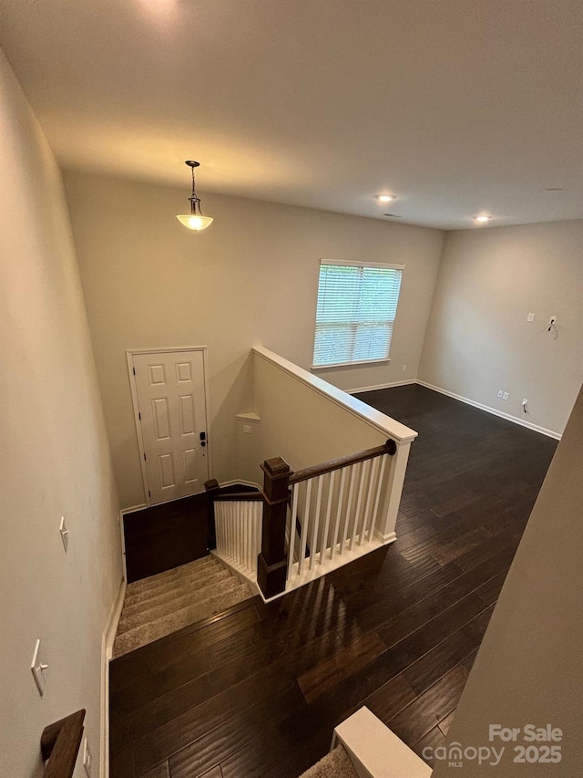 9236 Ainslie Downs St, Charlotte, NC 28273 - stairs with hardwood / wood-style floors, baseboards, and recessed lighting