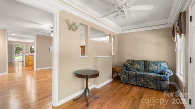 8321 Walkup Rd, Waxhaw, NC 28173 - sitting room with ceiling fan, crown molding, and light wood-style flooring
