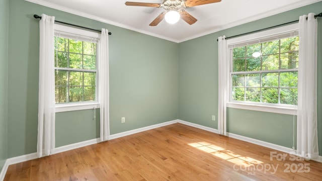 8321 Walkup Rd, Waxhaw, NC 28173 - spare room with ornamental molding, light wood-style flooring, and ceiling fan