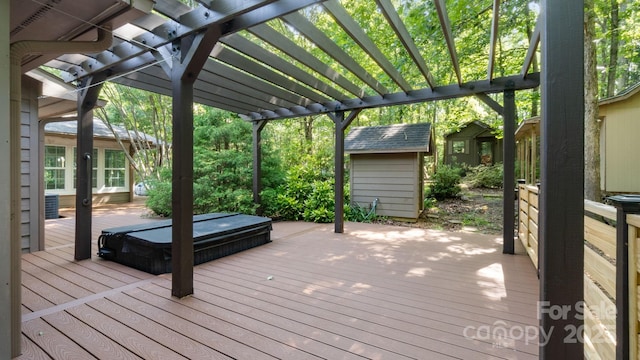 8321 Walkup Rd, Waxhaw, NC 28173 - wooden deck with a covered hot tub, a pergola, and a storage unit