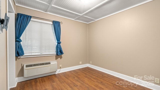 8321 Walkup Rd, Waxhaw, NC 28173 - spare room with a wall mounted AC and wood finished floors