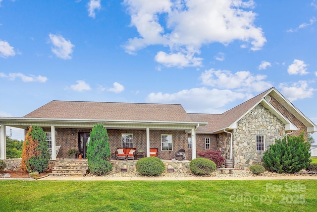 2843 Startown Rd, Lincolnton, NC 28092 - view of front of home featuring a front yard, stone siding, and covered porch