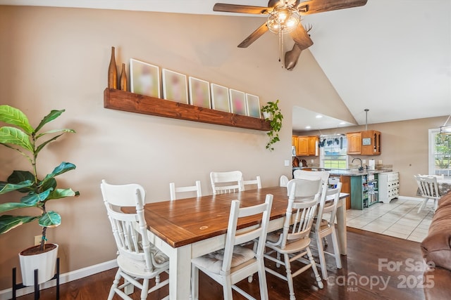 2843 Startown Rd, Lincolnton, NC 28092 - dining space featuring ceiling fan, lofted ceiling, light wood-style flooring, and baseboards