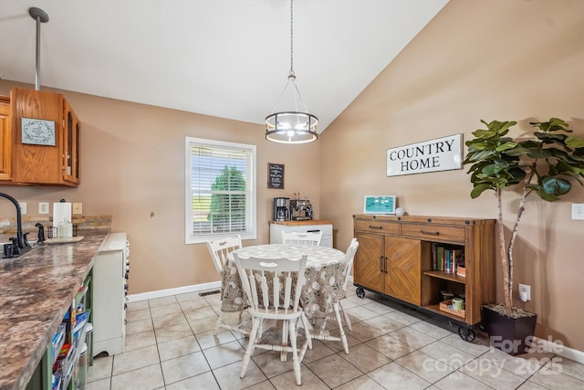 2843 Startown Rd, Lincolnton, NC 28092 - dining area with light tile patterned floors, baseboards, and high vaulted ceiling