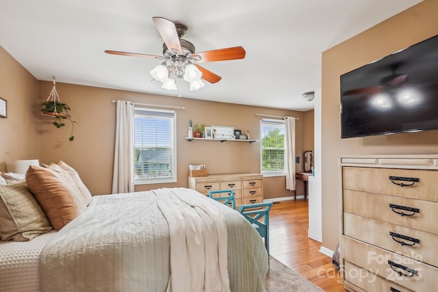 2843 Startown Rd, Lincolnton, NC 28092 - bedroom featuring light wood-style flooring, ceiling fan, and baseboards
