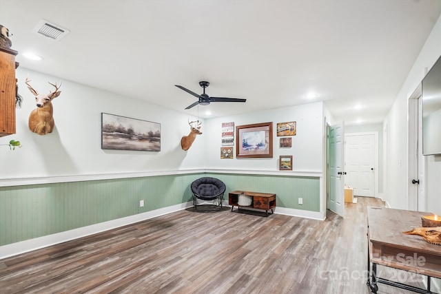 2843 Startown Rd, Lincolnton, NC 28092 - sitting room with wood finished floors, a wainscoted wall, recessed lighting, a ceiling fan, and baseboards