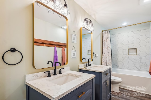 2843 Startown Rd, Lincolnton, NC 28092 - full bathroom with toilet, two vanities, shower / tub combo with curtain, and wood finished floors