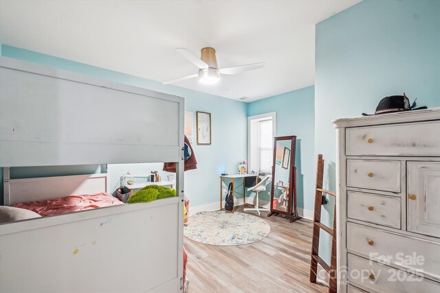 2843 Startown Rd, Lincolnton, NC 28092 - bedroom with baseboards, light wood-style flooring, and a ceiling fan