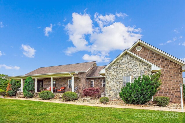 2843 Startown Rd, Lincolnton, NC 28092 - ranch-style house with a front lawn, brick siding, and stone siding