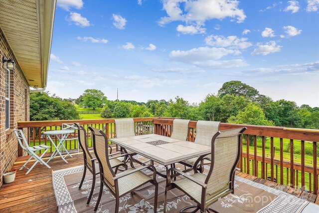 2843 Startown Rd, Lincolnton, NC 28092 - wooden terrace featuring outdoor dining space and view of wooded area