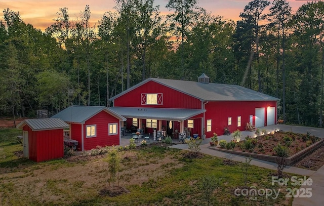 574 Crescent Rd, Rockwell, NC 28138 - view of front of property with an outdoor structure, a porch, and a detached garage