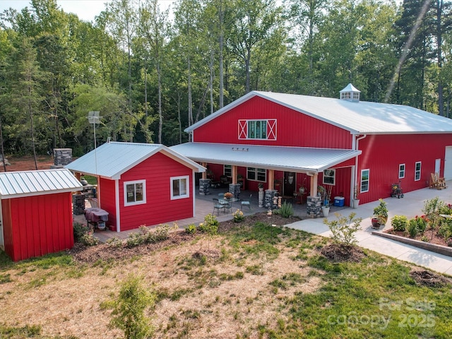 574 Crescent Rd, Rockwell, NC 28138 - view of front of property featuring metal roof and an outdoor structure