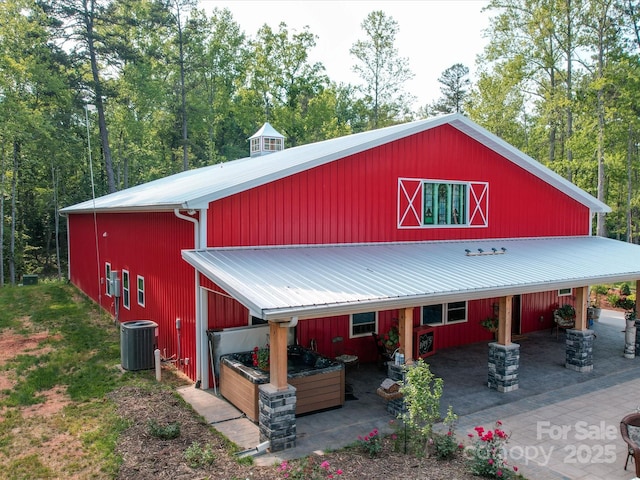 574 Crescent Rd, Rockwell, NC 28138 - view of front of property with central AC, a patio, and metal roof