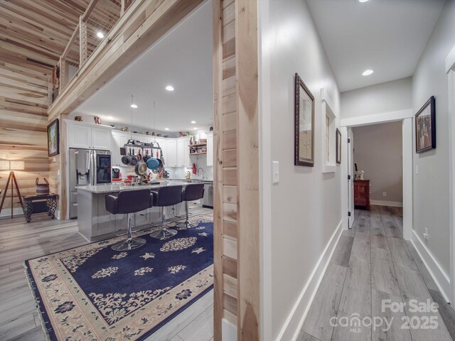 574 Crescent Rd, Rockwell, NC 28138 - corridor with light wood-type flooring, baseboards, and recessed lighting