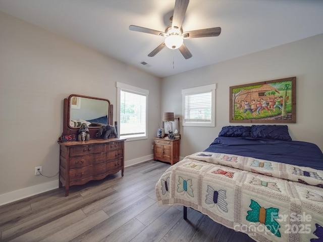 574 Crescent Rd, Rockwell, NC 28138 - bedroom with wood finished floors, baseboards, and ceiling fan