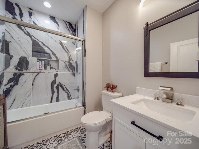574 Crescent Rd, Rockwell, NC 28138 - bathroom featuring vanity, shower / bath combination with glass door, and toilet