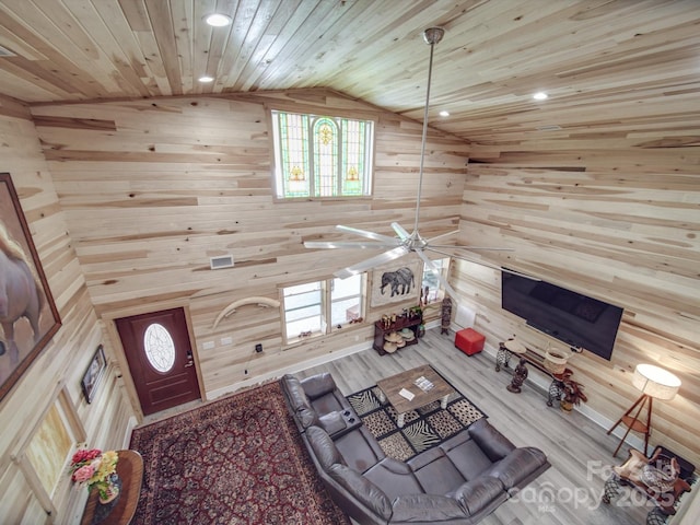574 Crescent Rd, Rockwell, NC 28138 - living area with wood walls, vaulted ceiling, recessed lighting, wood finished floors, and a ceiling fan