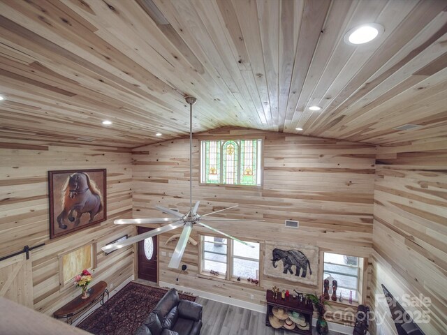 574 Crescent Rd, Rockwell, NC 28138 - living room with wood ceiling, wooden walls, wood finished floors, recessed lighting, and lofted ceiling