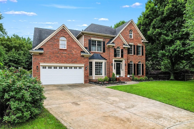 6432 Morningsong Ln, Charlotte, NC 28269 - view of front of property featuring a garage, brick siding, concrete driveway, and a shingled roof