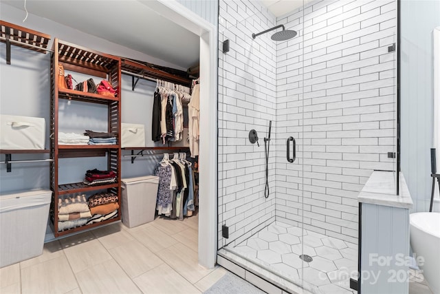 6432 Morningsong Ln, Charlotte, NC 28269 - bathroom with a stall shower and a walk in closet