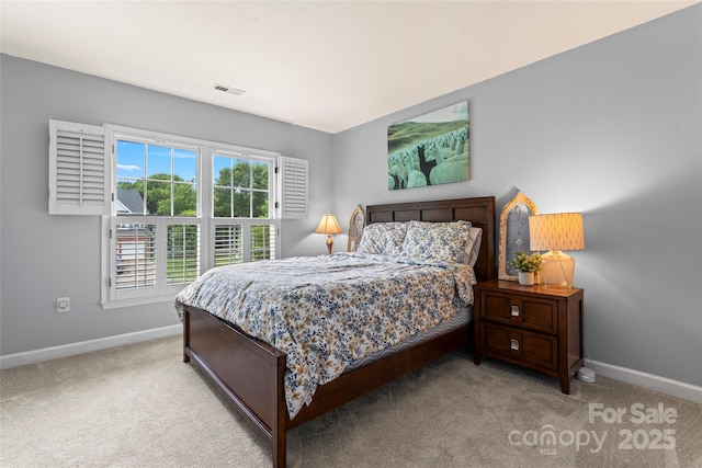 6432 Morningsong Ln, Charlotte, NC 28269 - bedroom featuring baseboards and light colored carpet