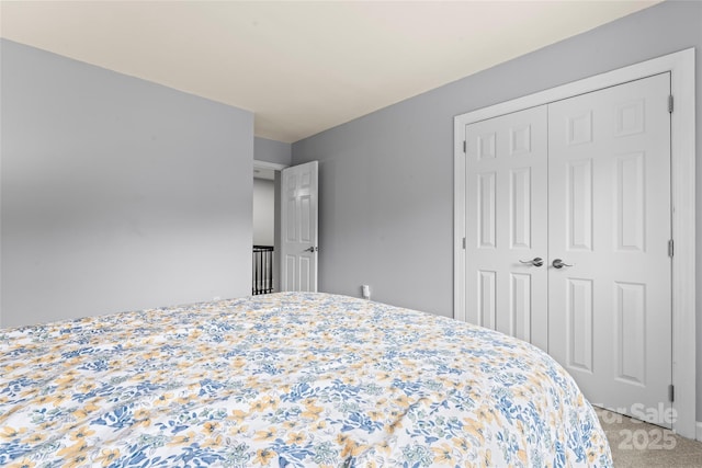 6432 Morningsong Ln, Charlotte, NC 28269 - bedroom featuring light colored carpet and a closet