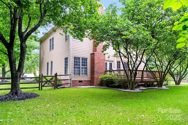 6432 Morningsong Ln, Charlotte, NC 28269 - view of home's exterior featuring a deck and crawl space